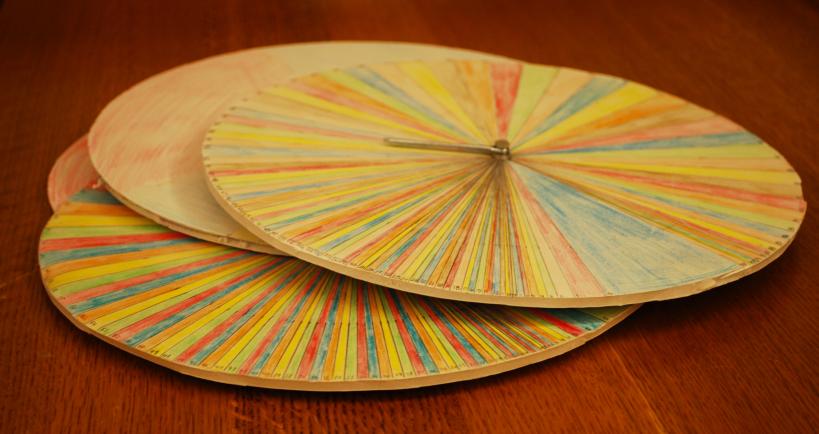 These paperboard spinning wheels model the United States population in 1930. The top wheel represents data on mortality among white women. Dan Bouk, Abigail Balfour, Erin Burke, and Christy Mills reconstructed these wheels from descriptions in the writings of biomathematician Alfred Lotka. Photo: D. Bouk.