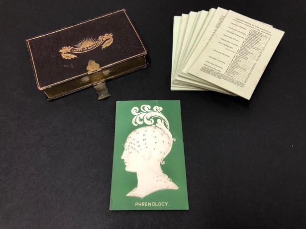 The “Casket of Knowledge,” including a top card with embossed profile of a phrenological head, and corresponding cards. Mrs. L. Miles, Phrenology and the Moral Influence of Phrenology: Arranged on 40 Cards, Illustrative of the System, (London: Ackermann and Co., 1835), History & Special Collections for the Sciences, UCLA Library Special Collections, BF870.P577 1835.