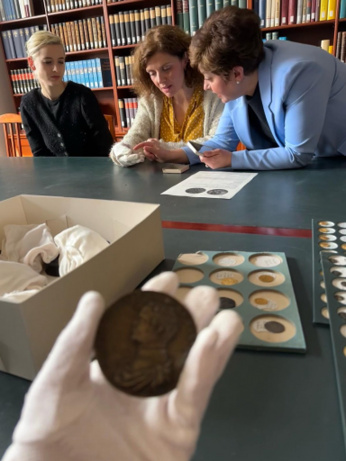 examining Coins